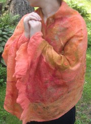 These summer shawls are perfect for chilly summer evenings or overcast days. Made of merino wool with lettuce edged hems they are embellished with hand dyed silk.